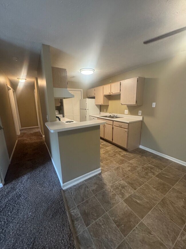 Foto del edificio - Quail Run Apts. (750 N. 18th Ave.)