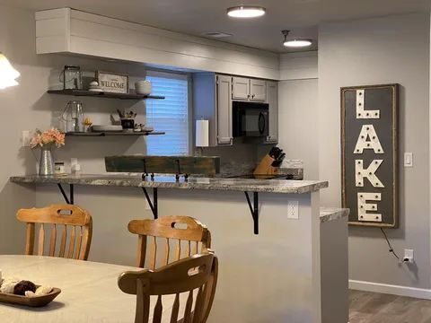 Building Photo - Fully furnished water front condos - BOAT SLIP INCLUDED