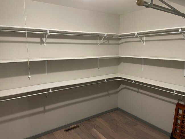 Walk-in closet in master bedroom. - 4080 S Fairway Dr