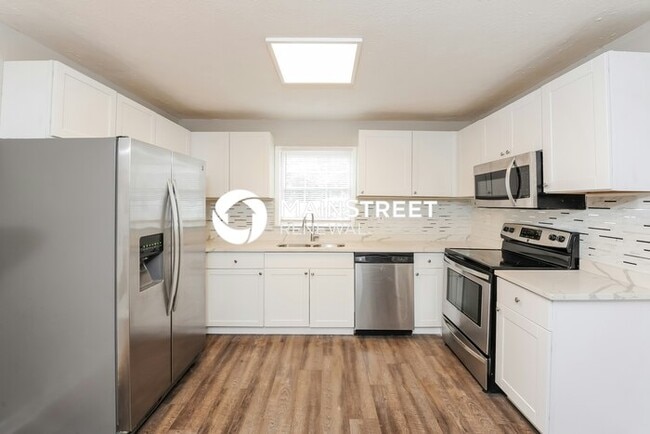 Building Photo - 4 Bedroom Pet-Friendly Home in Lilburn, GA with Main Street Renewal