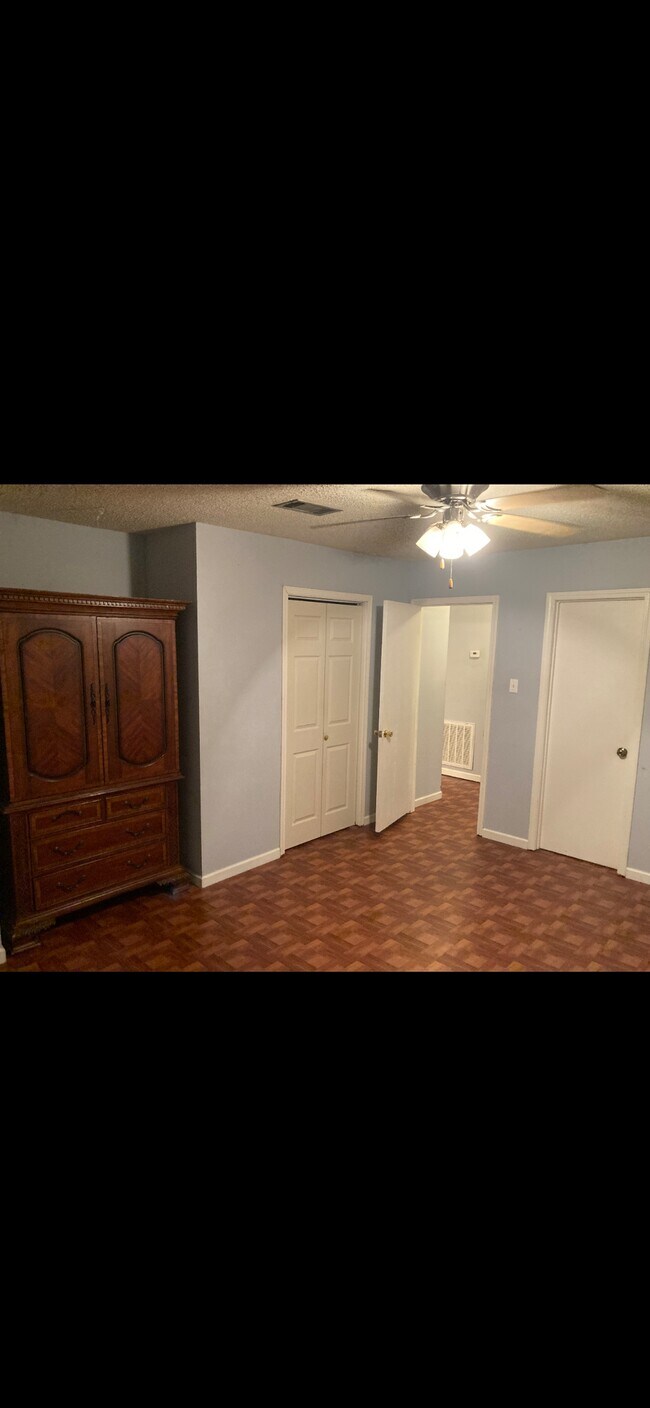 Beautiful cherry wood curio cabinet included. - 1541 Live Oak St