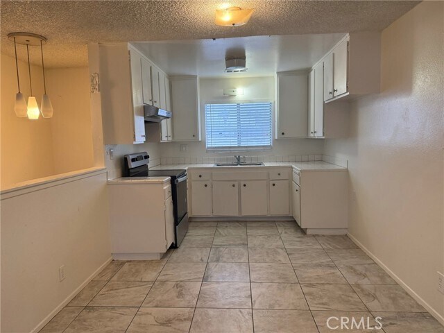 Foto del edificio - 221 E 25th St
