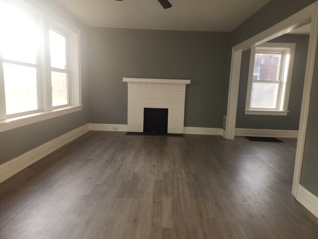 Building Photo - Charming & Spacious Updated Brick Home – P...