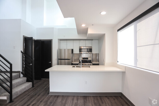 1BR, 1.5 BA w Loft- 750 SF - Edgemont Luxury Townhomes