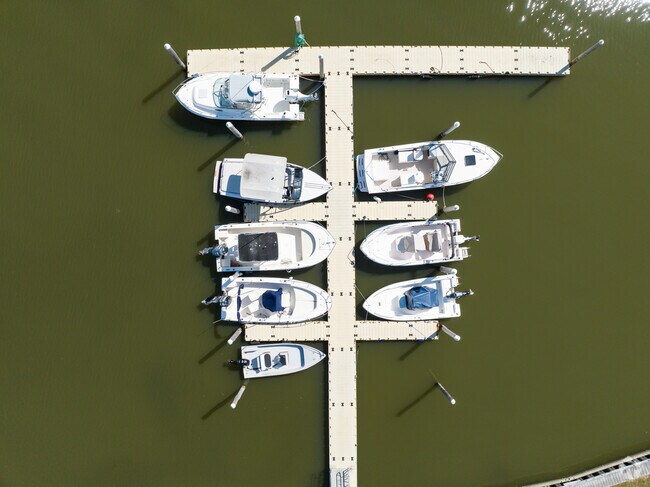 Dock slips at East Quogue Marine Park offer access to boating and waterfront views.