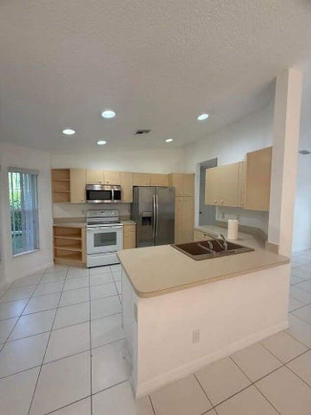 Photo - 100 Cocoplum Circle, Royal Palm Beach, FL 33411 - 4734