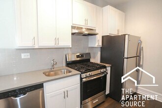 Building Photo - 1613 W Berteau Ave