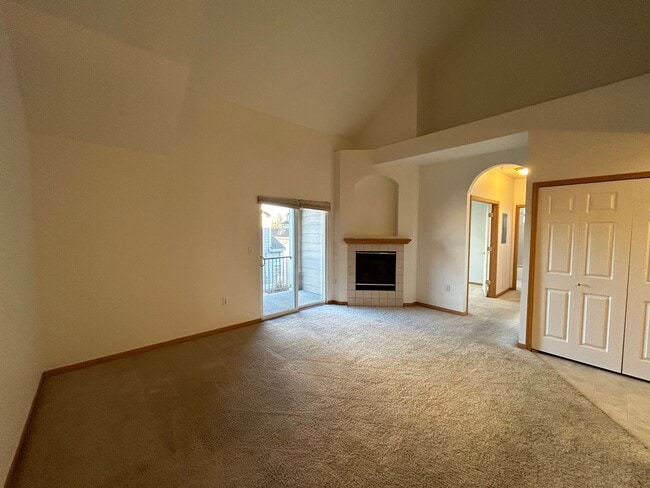 Building Photo - Bright 2-Bed Condo with Vaulted Ceilings, Garage & Balcony