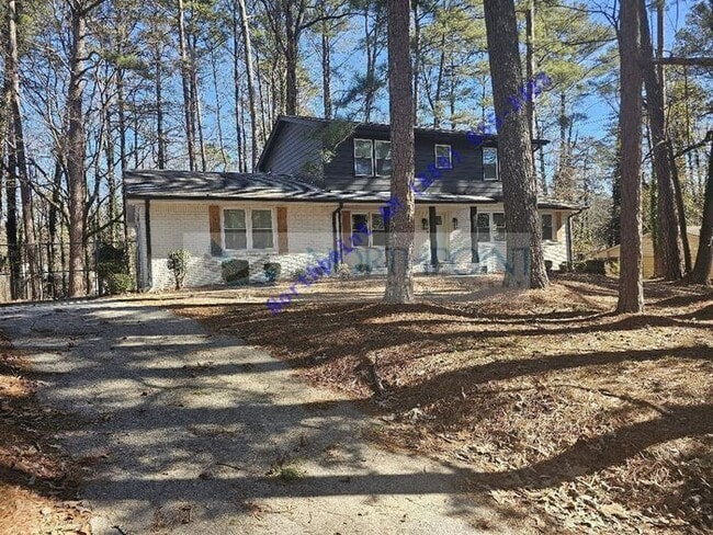 Photo - Beautiful 4BR 2BA Home w/ Quartz + SS Kitchen • Fenced Yard • Deck & Porch in SW Atlanta