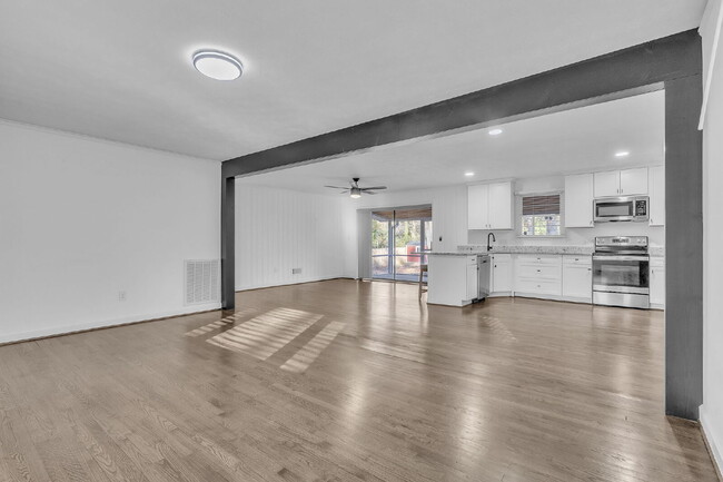 Building Photo - Stylishly Updated 3BR/1.5BA Residence with Exclusive Fenced Outdoor Space & Outbuilding