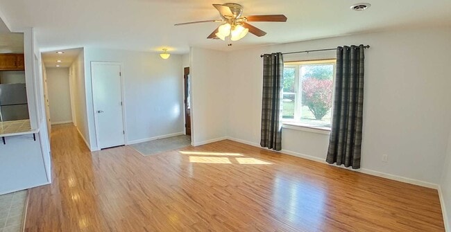 Building Photo - Covered Patio + HUGE Yard + Stainless Steel Appliances + Bonus Storage! Available March 6th!