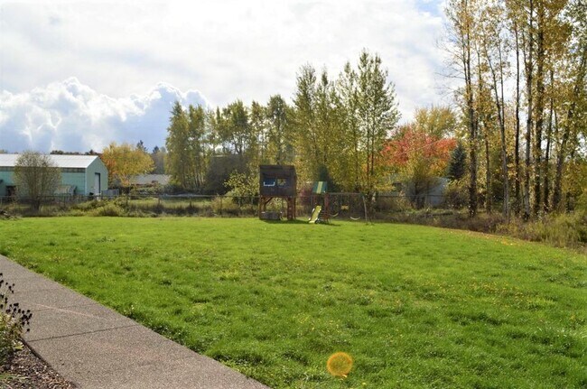 Building Photo - Custom Home, Country Charm, Modern Comfort...