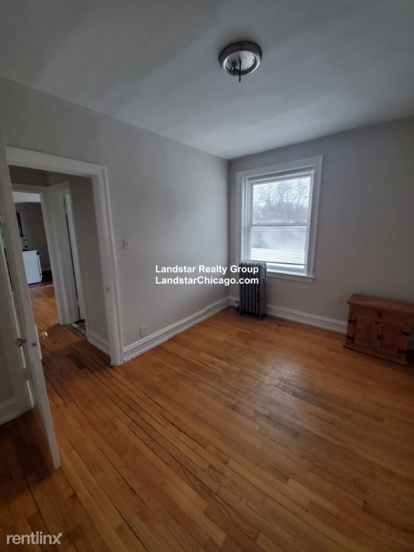 Building Photo - 7385 N Damen Ave
