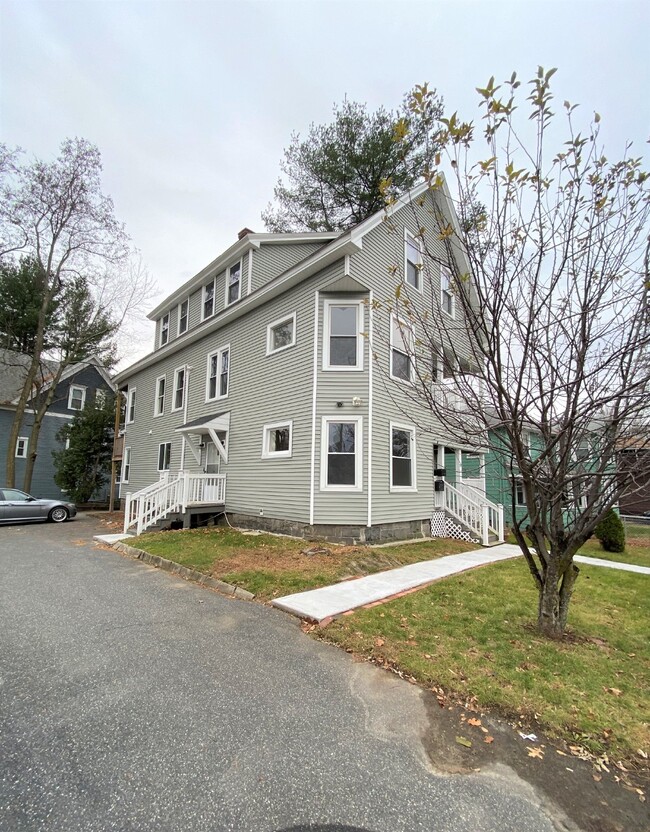 Building Photo - Modern and Spacious 2-Bedroom Rental in Wo...