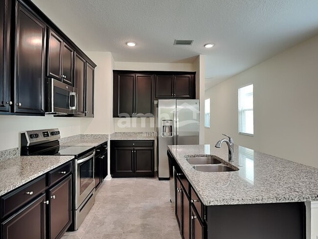 Building Photo - 8634 Firefly Pl