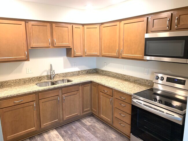 Updated kitchen with granite countertops - 65 Darlington Rd