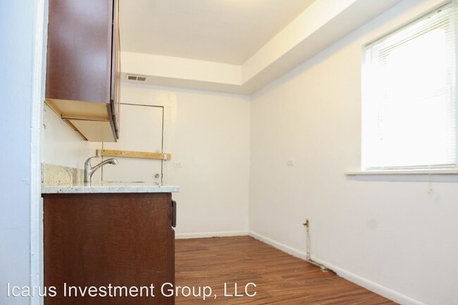 Building Photo - 6100-6108 S Eberhart Ave