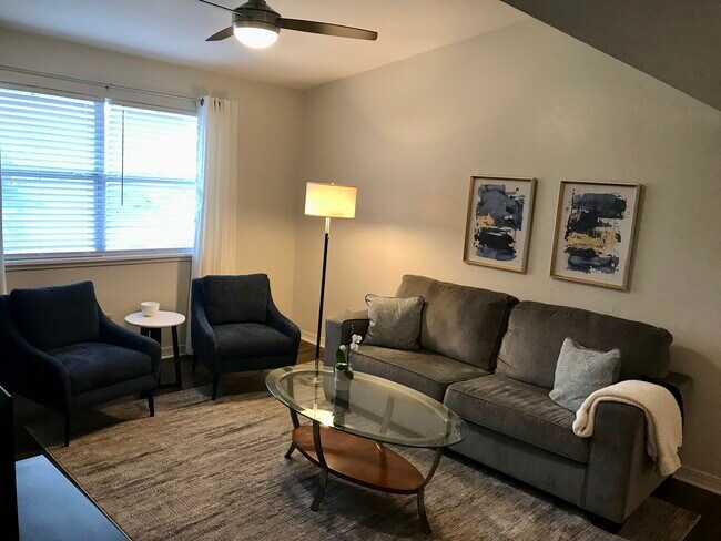 Living space with 55 inch TV - 2360 SW Archer Rd