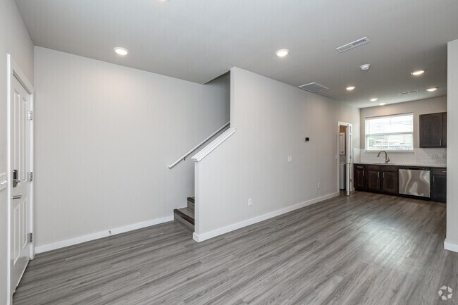 1 habitación, 1 baño - 740 pies cuadrados - Sala de estar - Thrive Fayetteville