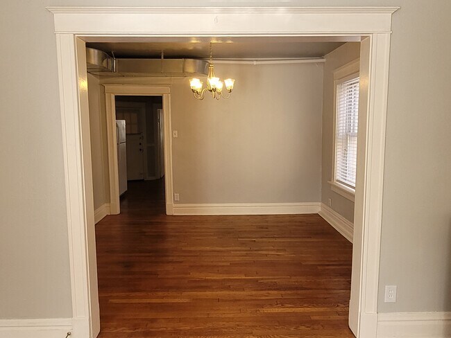 Enter the dining room from the living room. - 2055 Alfred Ave