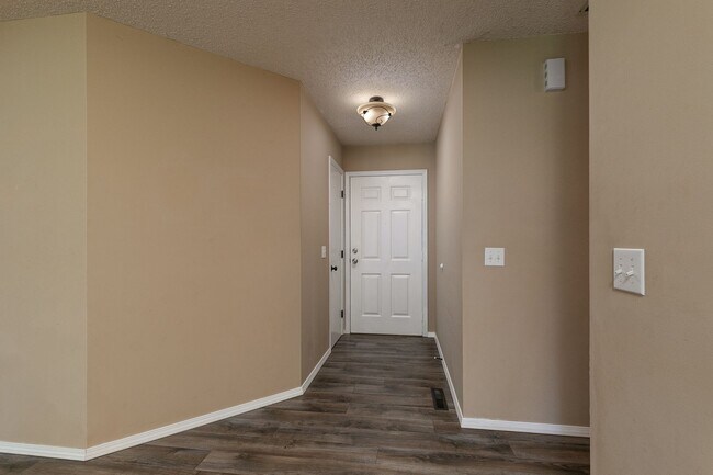 Building Photo - 3 Bedroom, 2 Bath With A 2 Car Garage & PE...