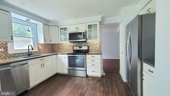 Foto del edificio - 7810 Muncaster Mill Rd