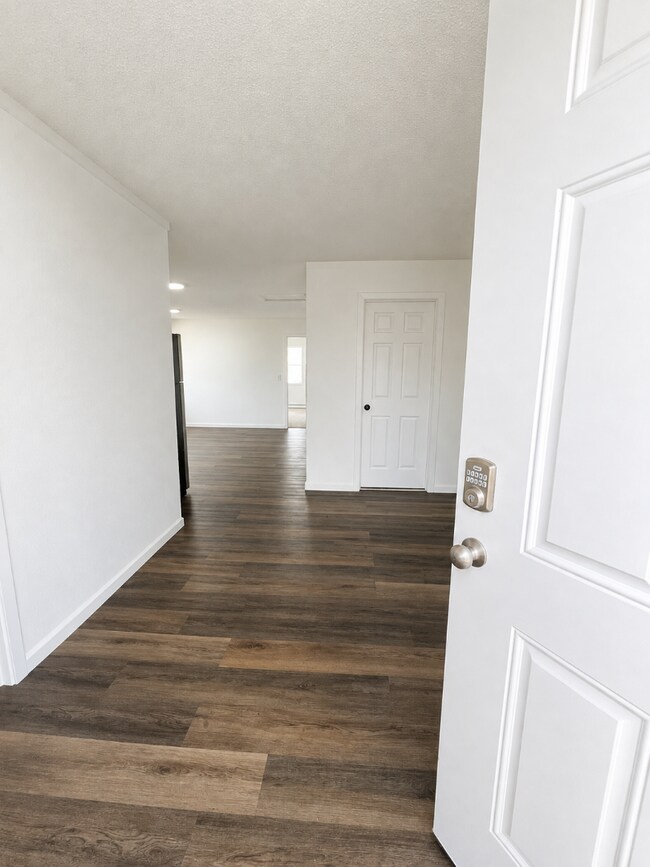 Building Photo - Elevated 3-Bedroom Home with Secure Garage & Cozy Living Space
