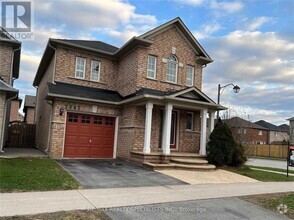 Building Photo - 5882 Blue Spruce Ave