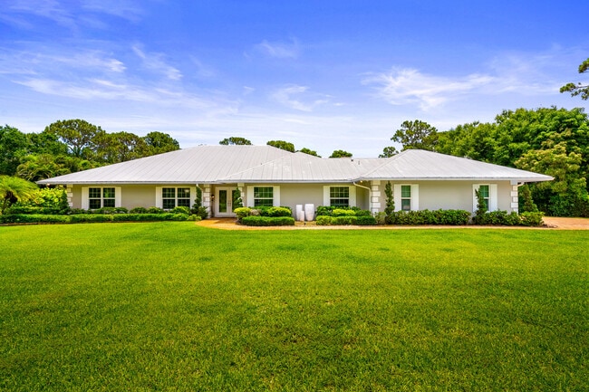 Foto del edificio - 7903 Plantation Lakes Dr