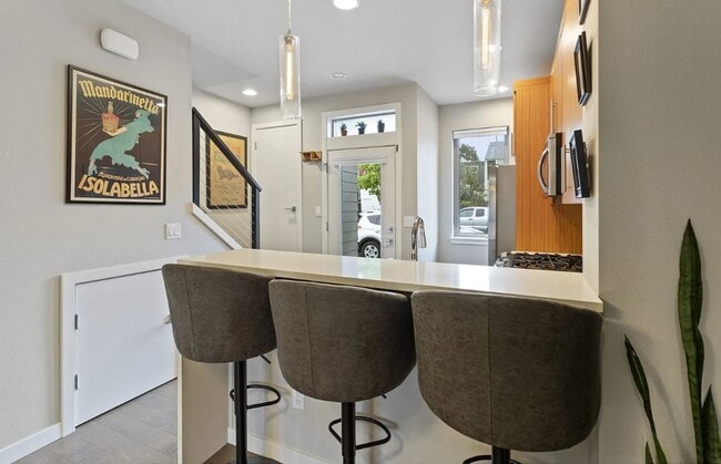 Building Photo - Dual Masters! Stunning Modern End-Unit Townhome in Buckman Bright, Airy & Designed for Comfort
