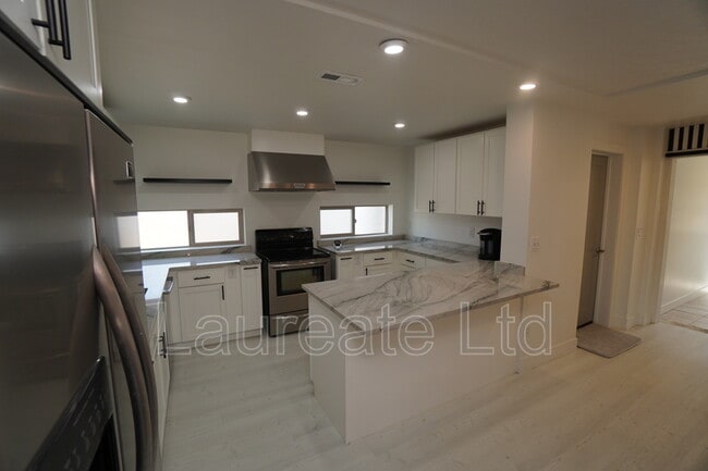 Building Photo - 5090 W 36th Ave