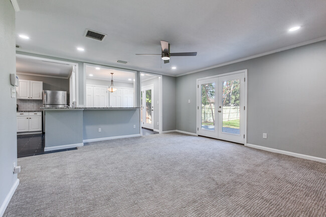 Open living room. New french doors open to deck - 8738 Glencrest Ln