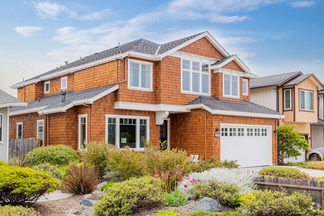 Clean shingle-style homes in Half Moon Bay are common.
