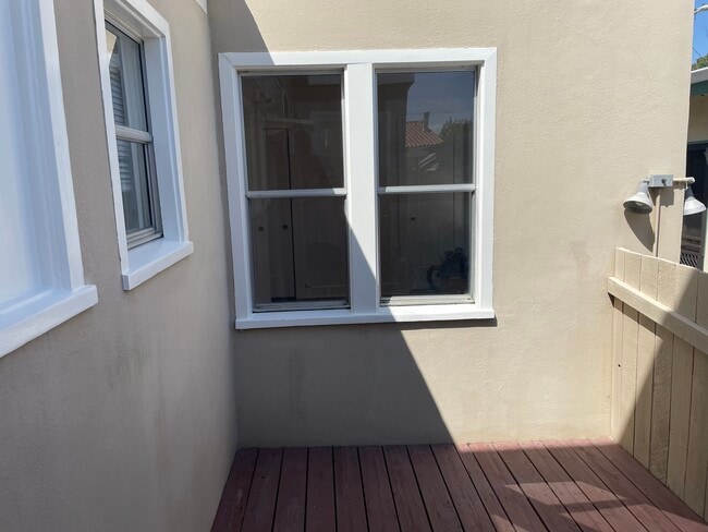 Back private patio with access from Bdrm #3 - 409 16th Pl