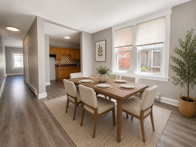 Foto del edificio - Spacious 3-Bedroom Rental with Front Porch, Backyard & Basement