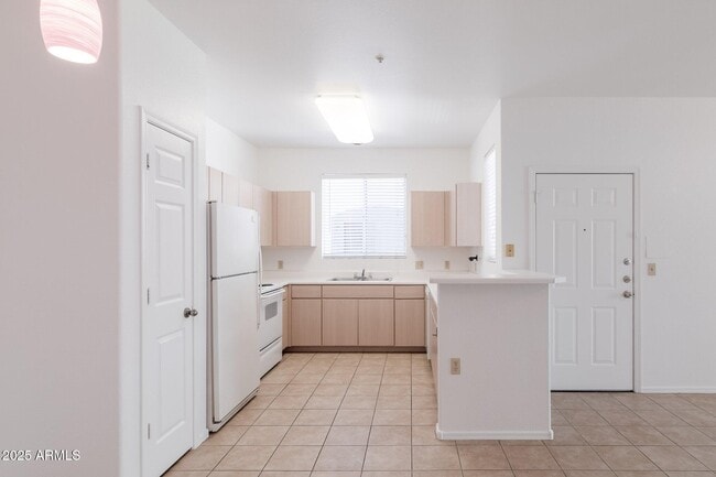 Building Photo - 1100 N Priest Dr