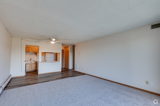 2BR, 2BA - 1,115SF - Living Room and Kitchen - Rosewood West
