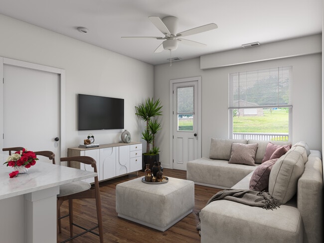 3BR, 2BA 2nd fl. - 1,110SF - Living Room - Bishop Pond Apartments