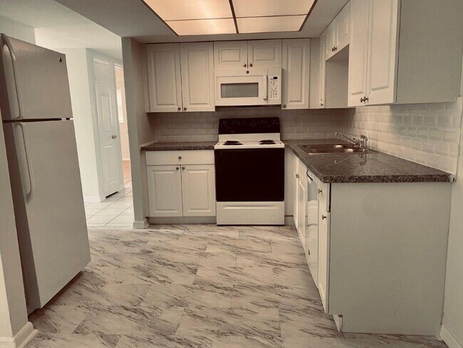 Building Photo - 12903 College Hill Dr
