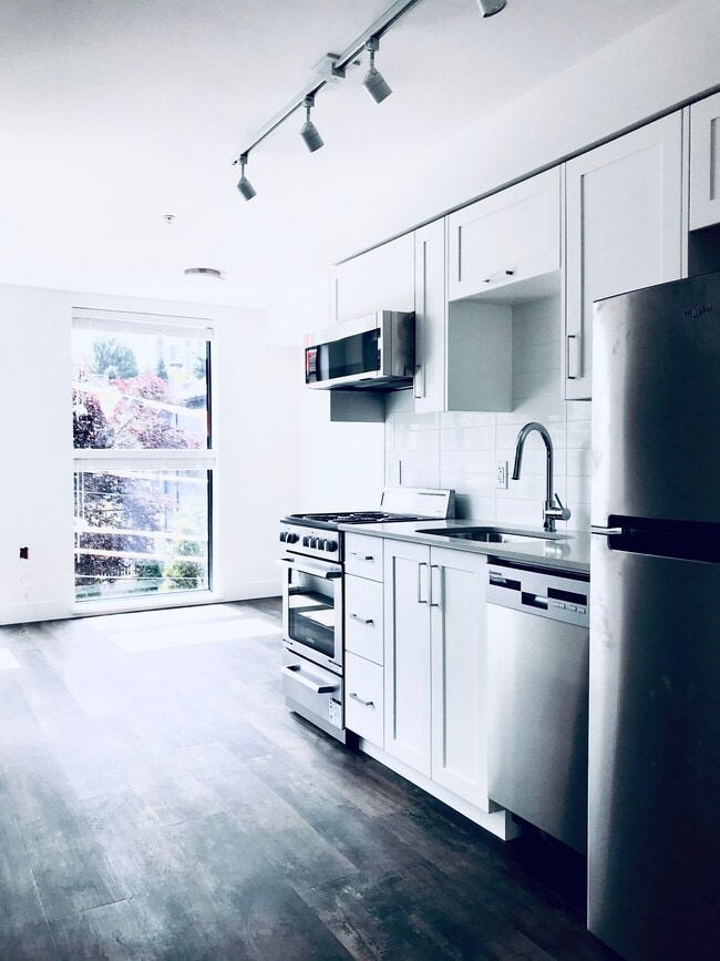 Building Photo - Sleek Modern 1-Bed with Rooftop Patio in the West End – $2,225/mo