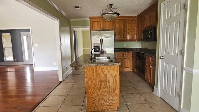 Building Photo - 4 Bedroom 2 Bath Brick Home W. Lee Co