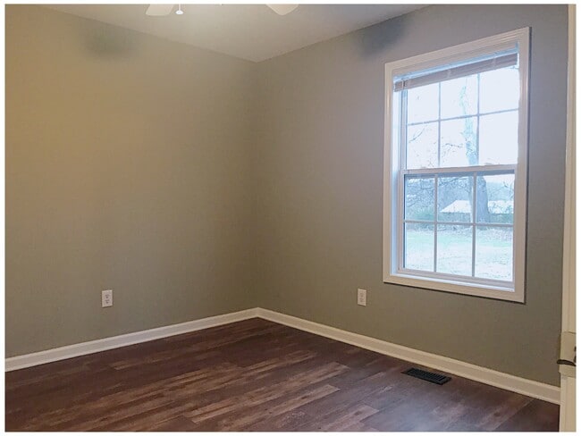 Bedroom 1 freshly painted and new flooring. - 216 Winters St