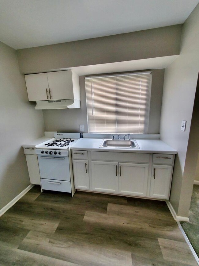 Building Photo - The Flats at Moores Run