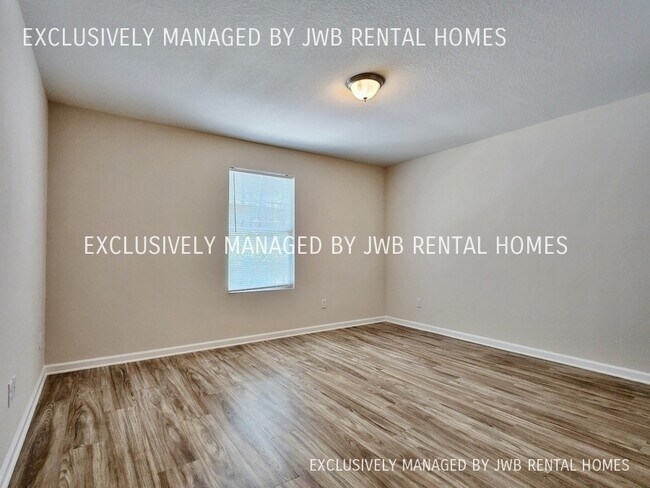 Building Photo - 8487 McGirts Village Ln