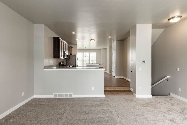 Building Photo - Spacious 4-Bedroom Townhome with Guest Suite, Modern Finishes & Prime Herriman Location