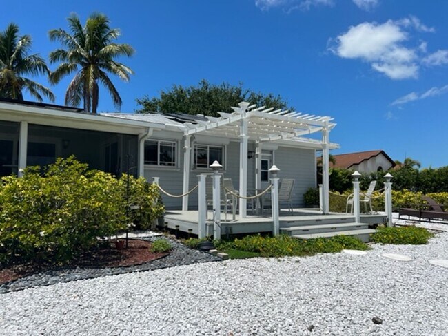 Building Photo - ** MARCO ISLAND HOME ON THE CANAL WITH PRI...