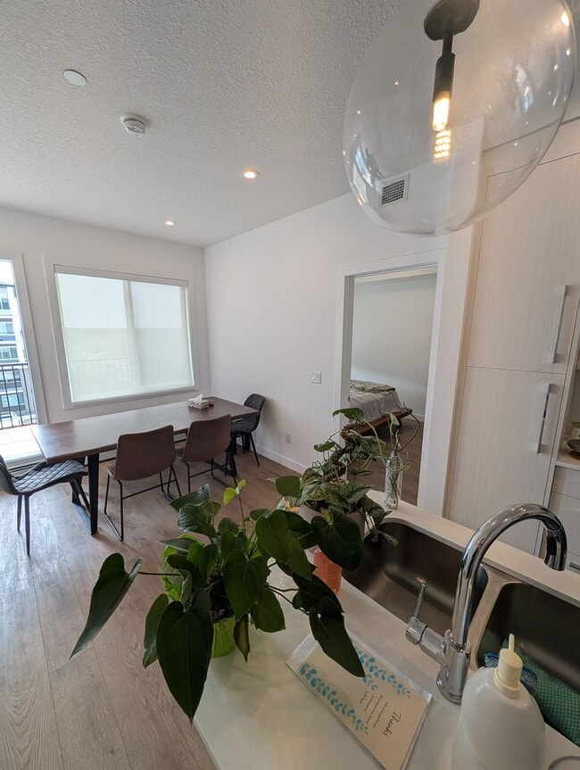 Building Photo - Modern 2 Bedroom + Den Condo with Underground Parking in Skyview Ranch (IP059)