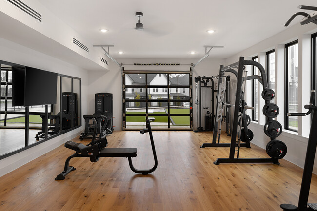 Libera tu potencial fitness en este gimnasio de apartamentos de última generación. - Livano Springdale