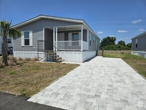 Building Photo - 6661 Hidden Oaks Dr