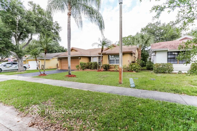 Building Photo - 9575 NW 25th Ct